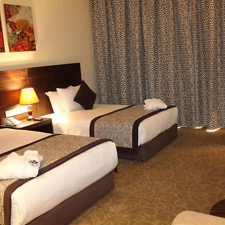 Tolip El Forsan Hotel Ismailia Exterior foto A room at the hotel